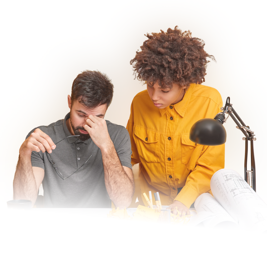 Team collaborating at a desk discussing challenges
