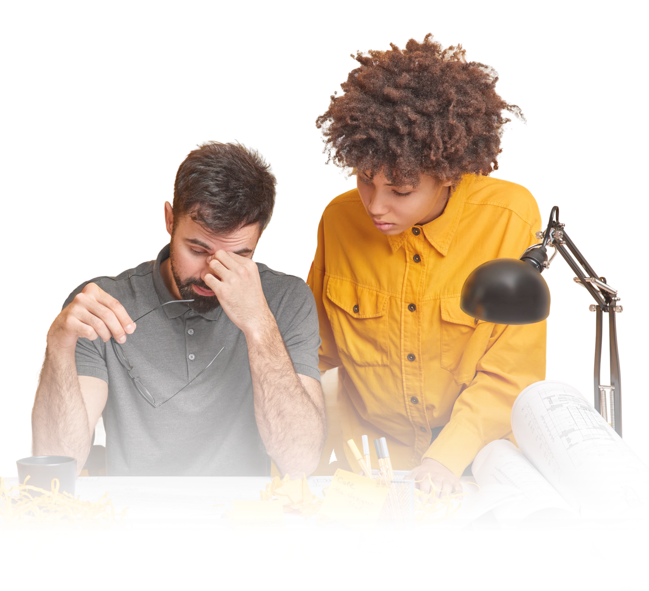 Team collaborating at a desk discussing challenges