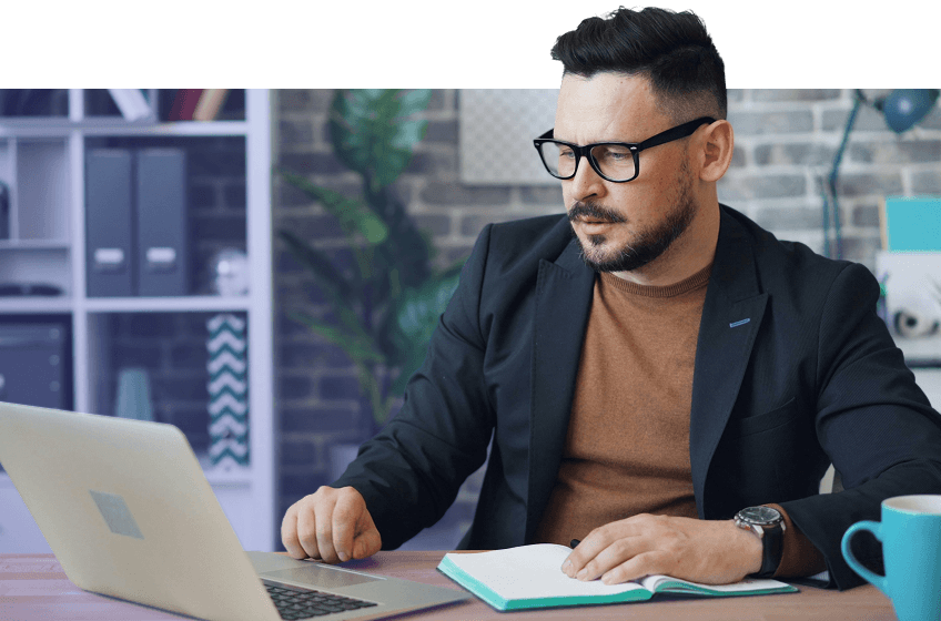 Business owner reviewing high-level sales performance metrics